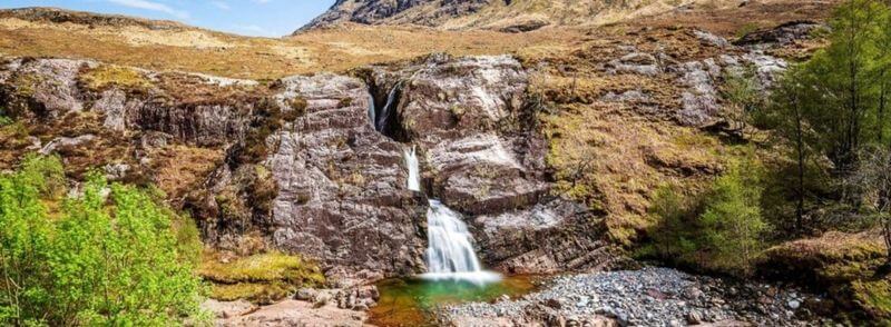 The Meeting of Three Waters en Glencoe, Escocia
